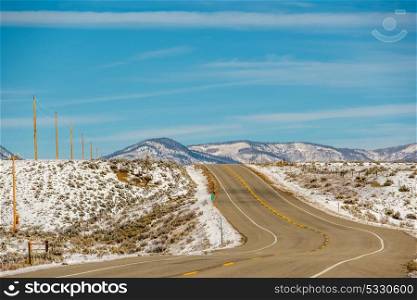 Season changing, first snow along highway in Colorado, USA.