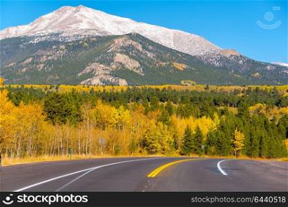 Season changing from autumn to winter. Highway in Colorado, USA.