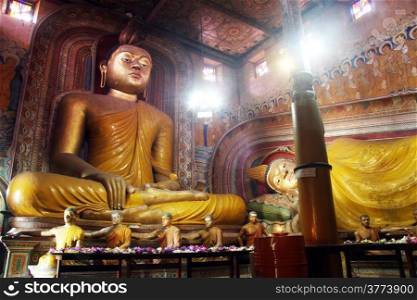 Seated and sleeping Buddhas in the temple Wewurukannala Vihara, Sri Lanka