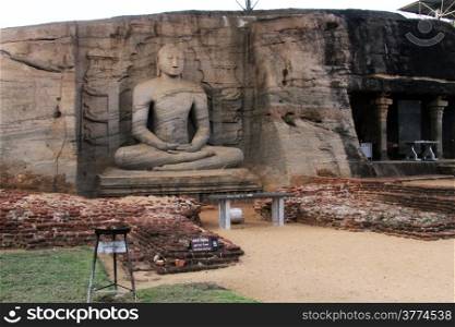 Seated Buddha and columns in Gal Vihara n Polonnaruwa, Sri Lanka