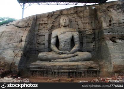 Seated Buddha under roof in Gal Vihara in Polonnaruwa, Sri Lanka