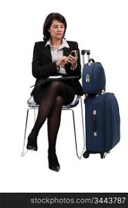 Seated Woman with suitcases
