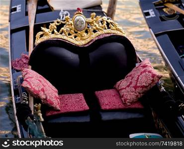 Seating on a gondola in Venice