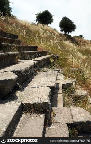 Seats of ancient theater in Erytrai in Turkey
