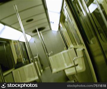 Seats on a subway train.