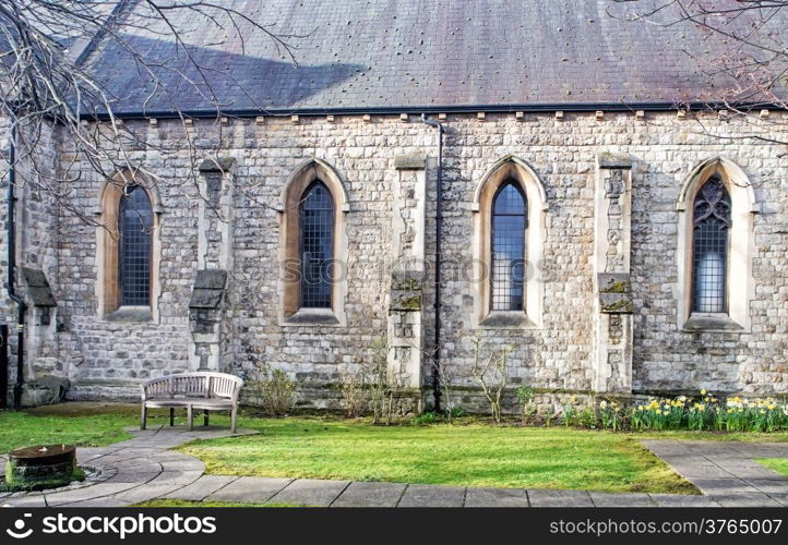 Secluded bench near gothic chapel in London