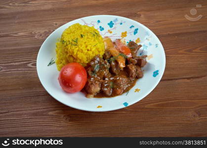 Seco de Chivo - Secos are thick Ecuadorian stews, usually served with yellow rice and fried plantains