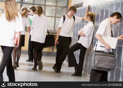 Secondary school students in a school hallway