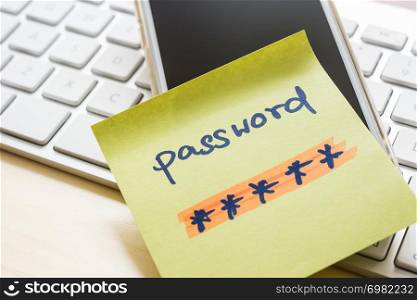 Secret passwords with highlight colors written on paper note stick on smart phone with modern white keyboard on background. Internet banking, data privacy and cyber security concepts.