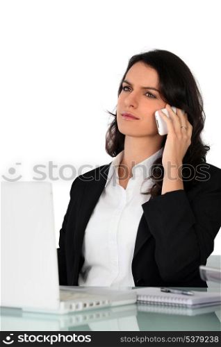 Secretary concentrated on the phone