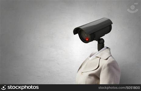 Secure your privacy. Portrait of camera headed woman in suit as security concept