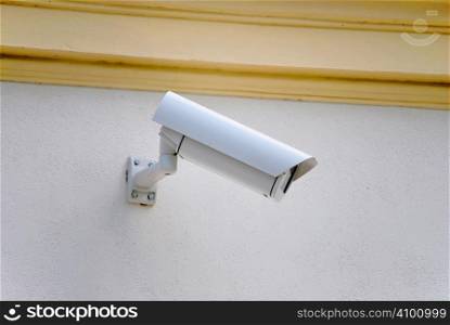 Security camera on the wall.