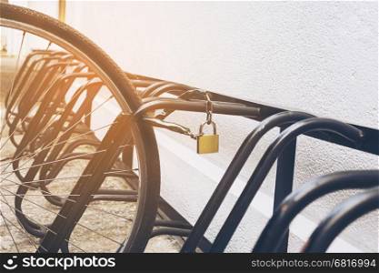 Security chain key lock for bicycle wheel in campus