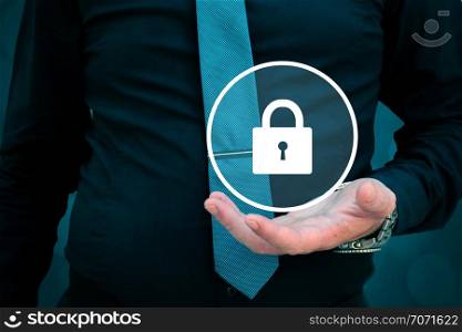 security concept, businessman holding lock in his hand.. security concept, businessman holding lock in his hand
