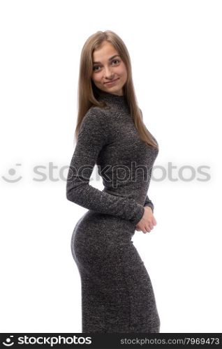 Seductive woman in a gray dress in the studio. Isolate on white background.
