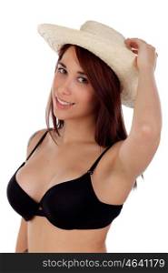Seductive woman with black bra and straw hat looking at camera