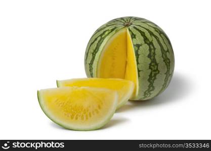 Seedless yellow watermelon on white background