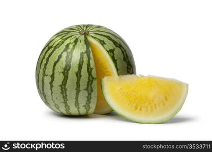 Seedless yellow watermelon on white background