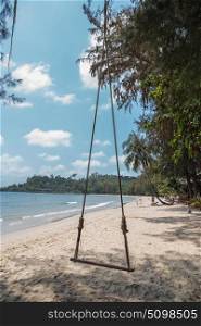 Seesaw on the beach of a tropical island