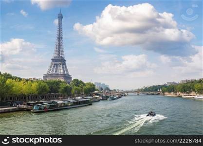 Seine in Paris and Eiffel tower in beautiful summer day in Paris