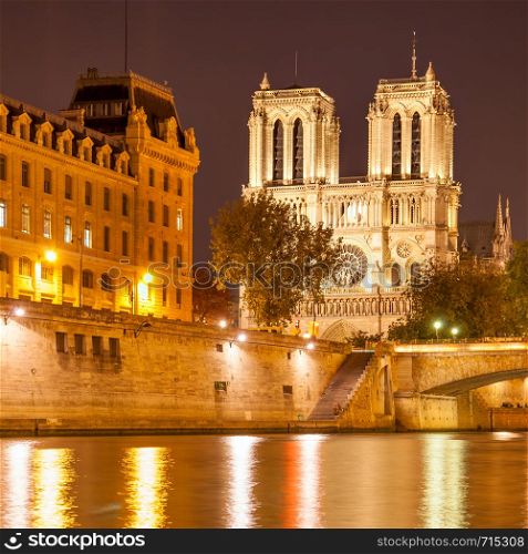 Seine river and Notre Dame de Paris at night, France