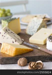 Selection of British Cheeses with Walnuts Biscuits and Grapes