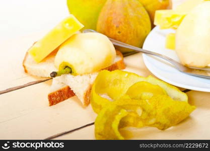 selection of cheese and fresh pears appetizer snack