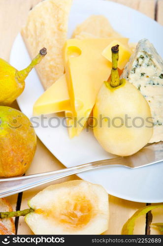 selection of cheese and fresh pears appetizer snack