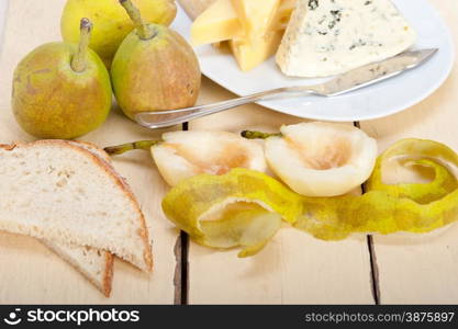 selection of cheese and fresh pears appetizer snack