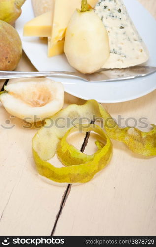 selection of cheese and fresh pears appetizer snack