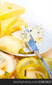 selection of different cheese and fresh pears appetizer snack 