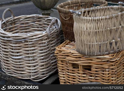 Selection of hand-made wicker log baskets.