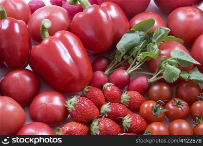 Selection of red fruit and vegetables
