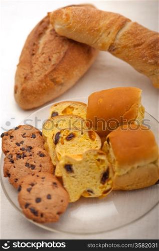 selection of sweet bread and cookies for breakfast