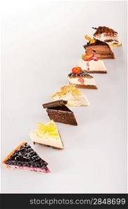 Selection of sweet cake slice delicious tart piece choice
