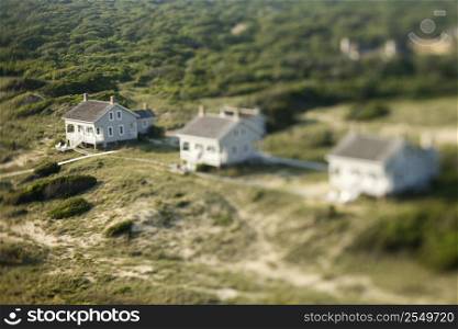 Selective focus aerial of beach cottages in Bald Head Island, North Carolina.