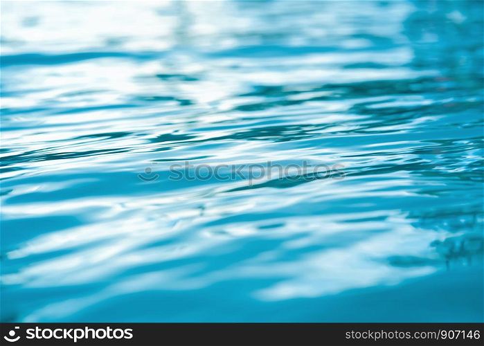 selective focus blue pool water background