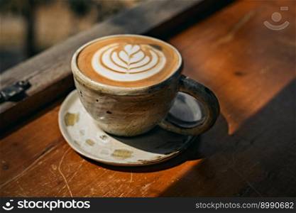 Selective focus cup of hot latte art coffee,focus at white foam. Selective focus cup of hot latte art coffee