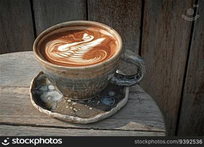 Selective focus cup of hot latte art coffee,focus at white foam. Selective focus cup of hot latte art coffee