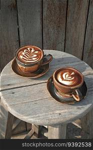 Selective focus cup of hot latte art coffee,focus at white foam . Selective focus cup of hot latte art coffee