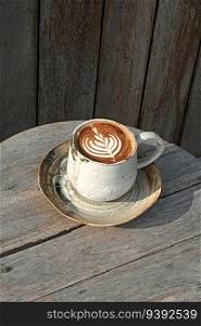 Selective focus cup of hot latte art coffee,focus at white foam
. Selective focus cup of hot latte art coffee