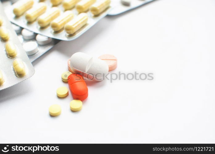 Selective focus of colorful Medical Pills on white background. closeup. Healthcare and medicine. Medical pharmacy concept. Health day. Copyspace. Selective focus of colorful Medical Pills on white background. closeup. Healthcare and medicine. Medical pharmacy concept. Health day