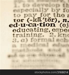 Selective focus of dictionary definition for the word education.