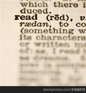 Selective focus of dictionary definition for the word read.