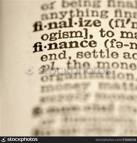 Selective focus of dictionary entry for the word finance.