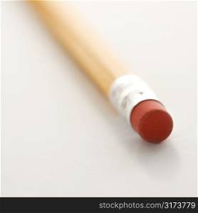 Selective focus of eraser on a pencil.