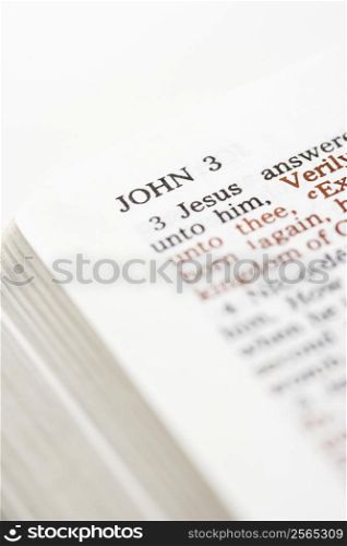 Selective focus of John 3 verses in open Holy Bible.