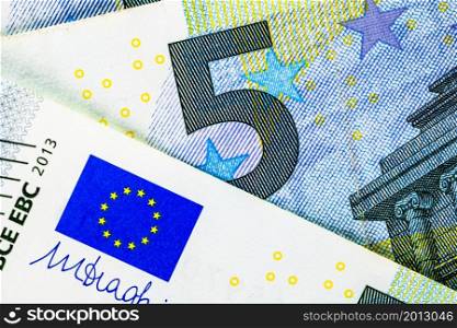 Selective focus on detail of EURO banknotes. Close up macro detail of EURO banknotes. World money concept, inflation and economy concept