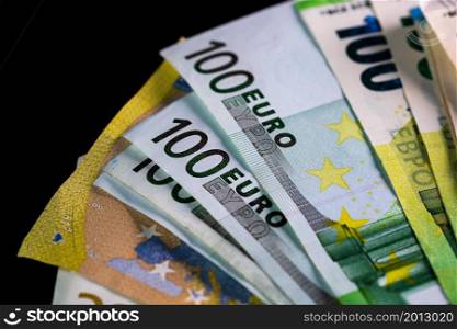 Selective focus on stack of EURO money. Euro banknotes isolated.