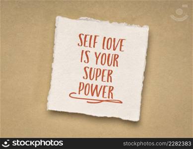 self love is your super power - inspirational handwriting on a small square sheet of blank white Khadi paper against beige rag paper, personal development concept